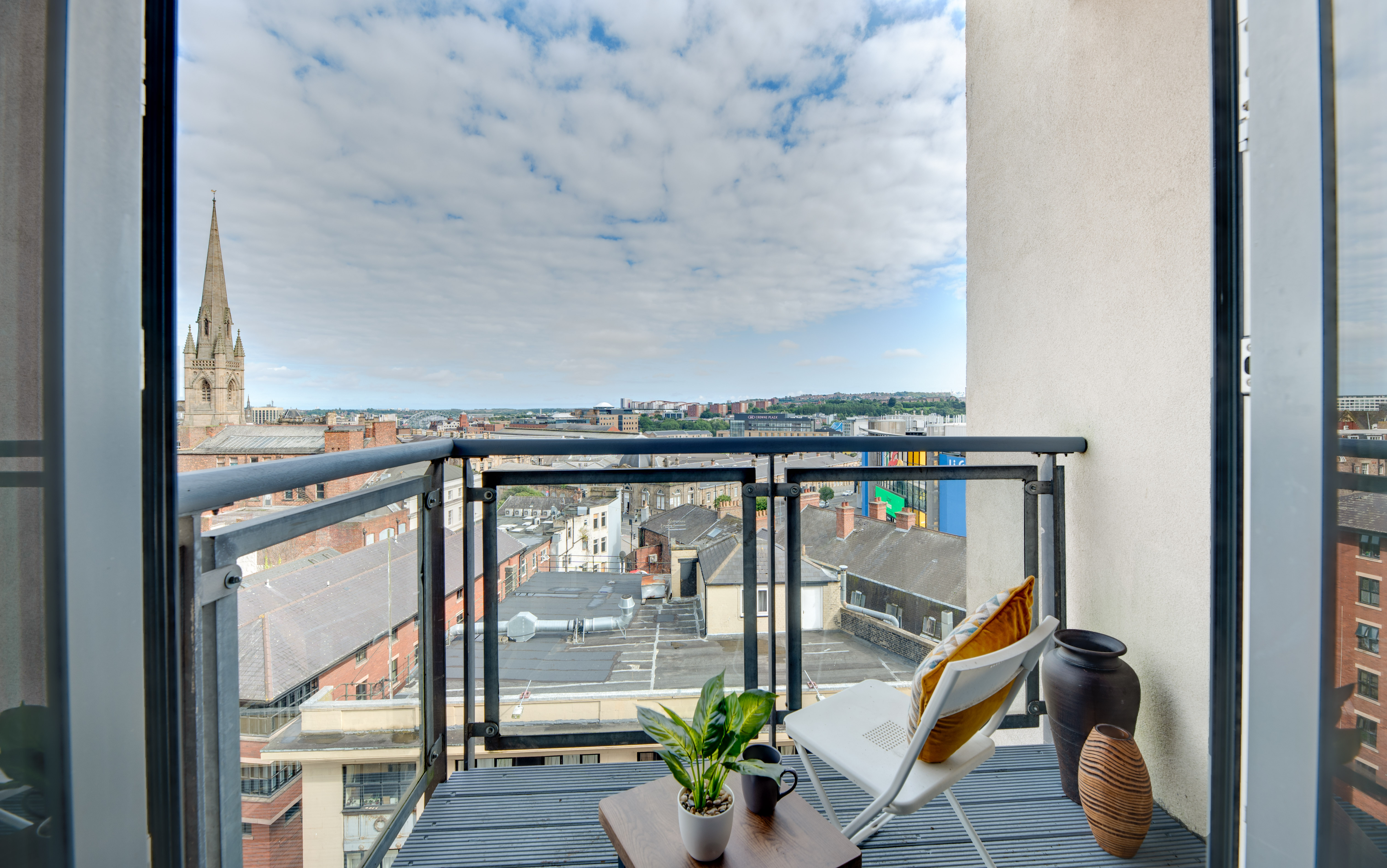Balcony accesses from lounge with seating area