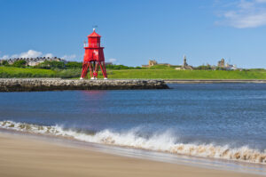 Herd Groyne at South Shields looking toward Tynemouth Priory at the mouth of the River Tyne.