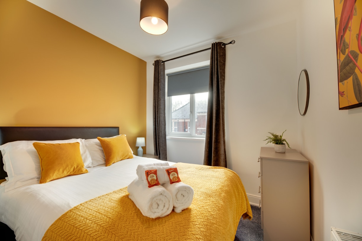Brandon Grove - double bedroom with bedside tables and wardrobe