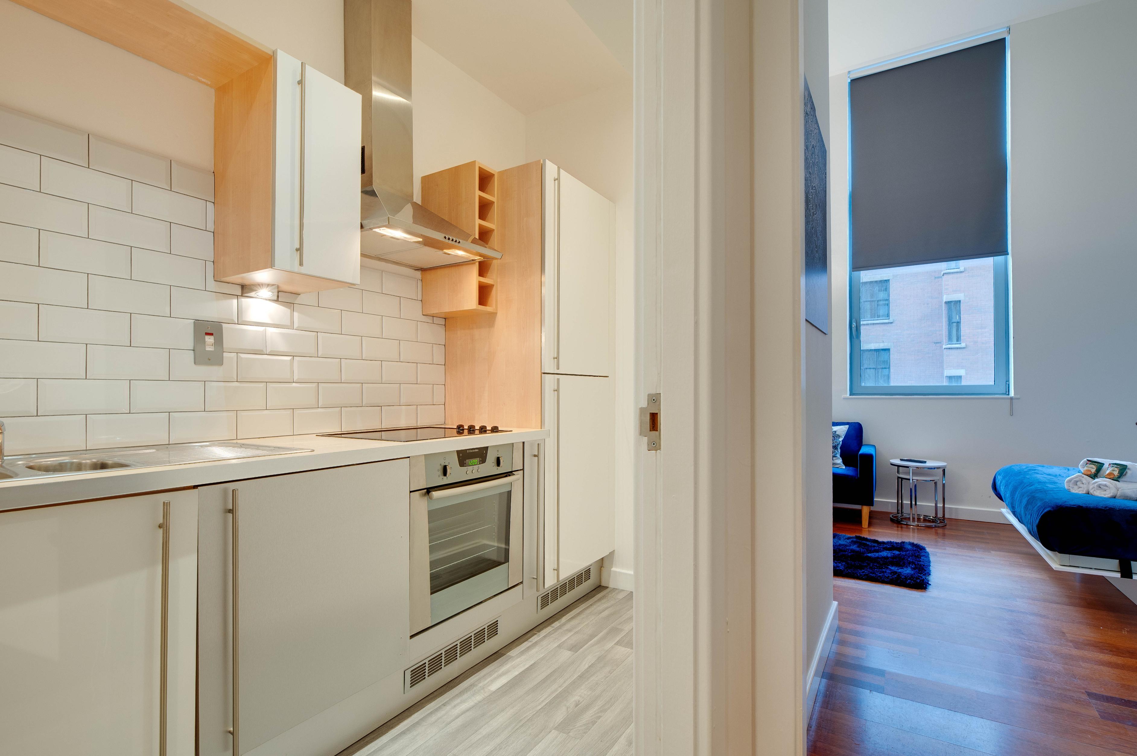 Crown Apartments Studio - view through to separate kitchen